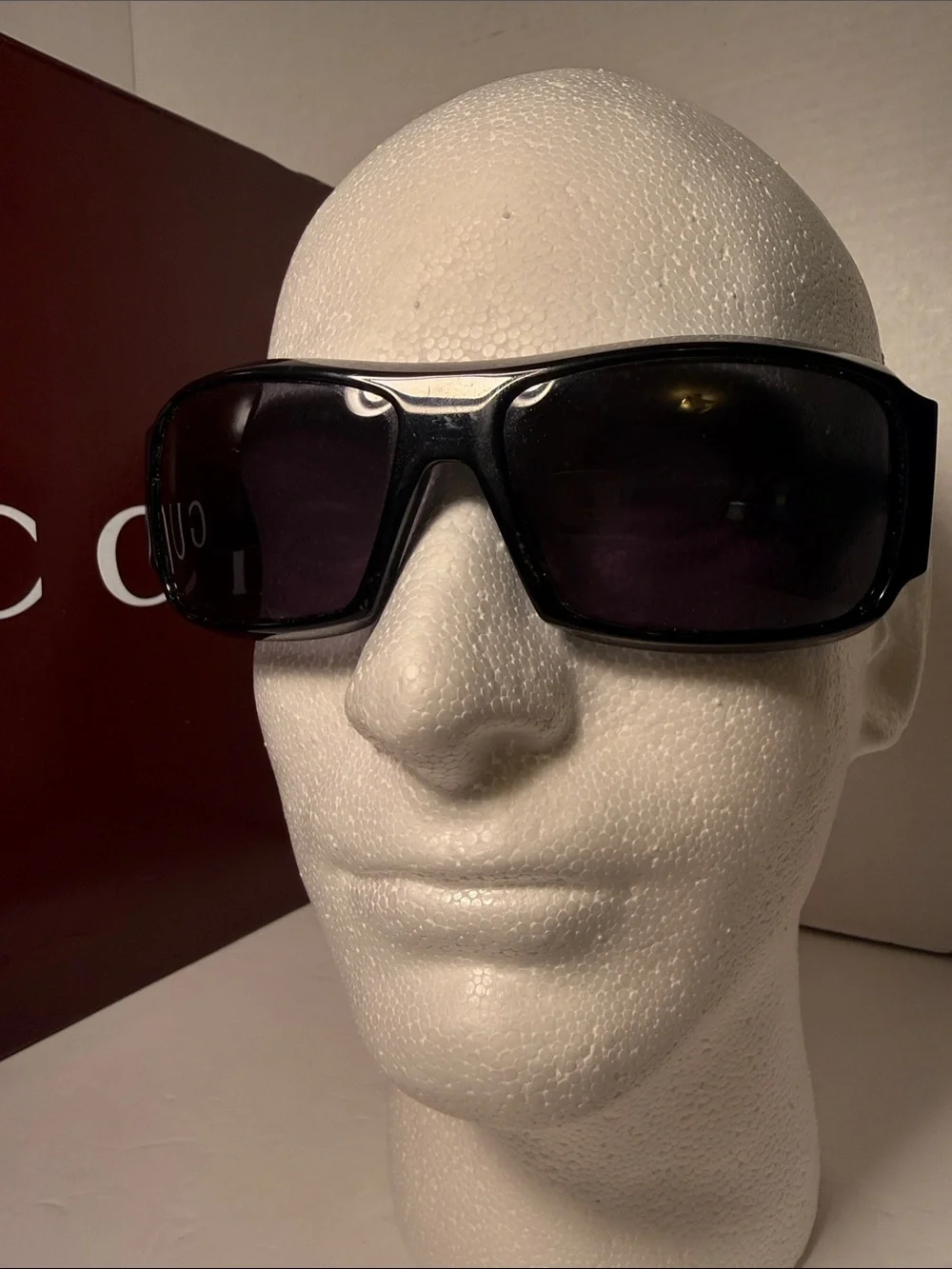 Vintage Gucci Black Sunglasses with Dark Lenses and Logo Temples
